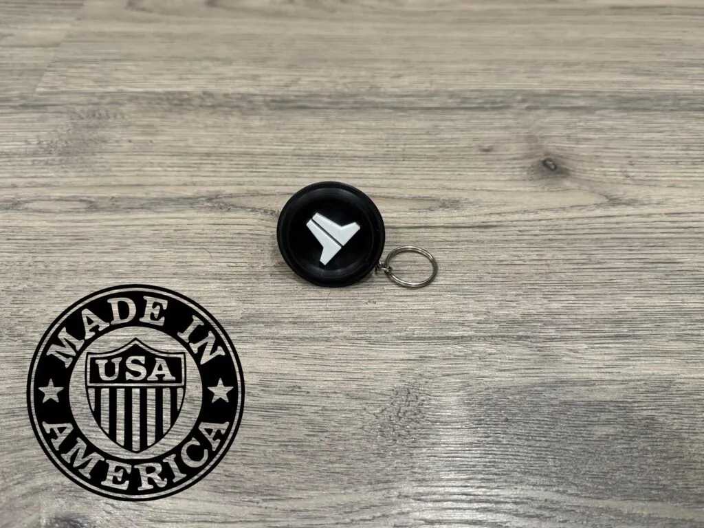JL Audio-inspired subwoofer keychain front view